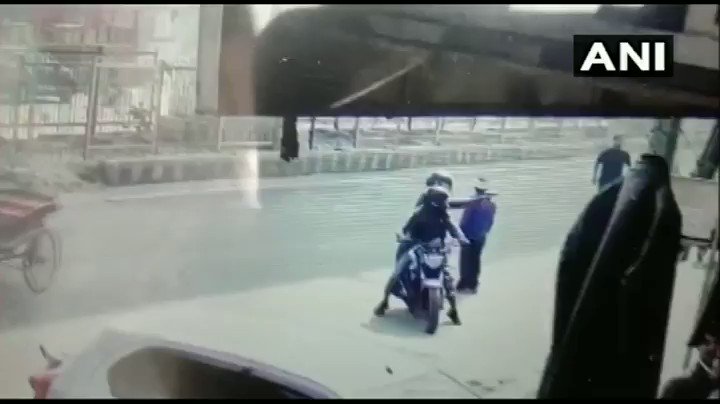 CCTV footage of two unidentified persons opening fire in front of a shop in Delhi's Jafarabad area earlier today. Police investigation is underway