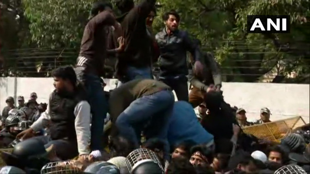 Delhi: Jamia Coordination Committee's (JCC) protest march against CAA, NRC, & NPR, from Jamia to Parliament, stopped by security forces near Holy Family Hospital in Okhla