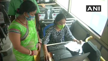 Kolkata Municipal Corporation launches 'Vaccination on wheels' drive to administer COVID19 vaccine shots to people working in marketplaces. (ANI)