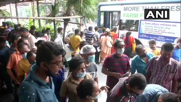 Kolkata Municipal Corporation launches 'Vaccination on wheels' drive to administer COVID19 vaccine shots to people working in marketplaces. (ANI)